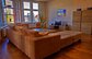 ( F) AmsterHome Damrak View– Living room